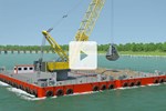 Liebherr HS 8300 duty cycle crawler crane in dredging application on a barge