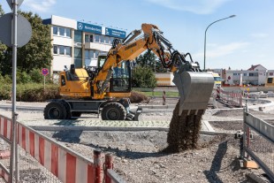 Liebherr wheeled excavator A 910 Compact working at a construction site in Ulm (Germany)
