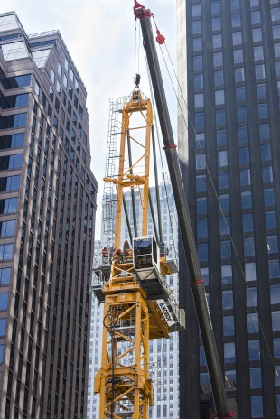 The Liebherr 710 HC-L luffing crane erection at MoMA Tower in New York City.