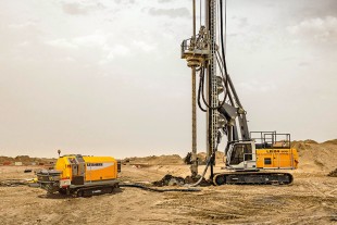 Liebherr THS 110 D-K crawler concrete pump with Liebherr drilling rig.