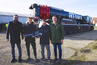 Handover of the LTM 1450-8.1 crane to RT-trans (from left to right): Dusko Tadic with his son Matija Tadic (both RT-trans), Thomas Fiesel (Liebherr-Werk Ehingen GmbH) and Nikola Savkovic (D.S. Inzenjering).