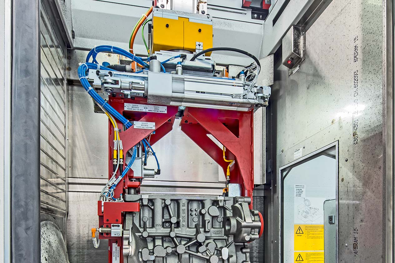 Loading machine tools using gantry robots